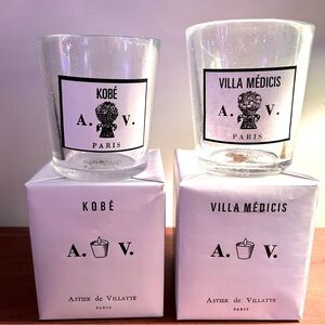 Two empty handblown Astier de Villatte luxury French candle jars.